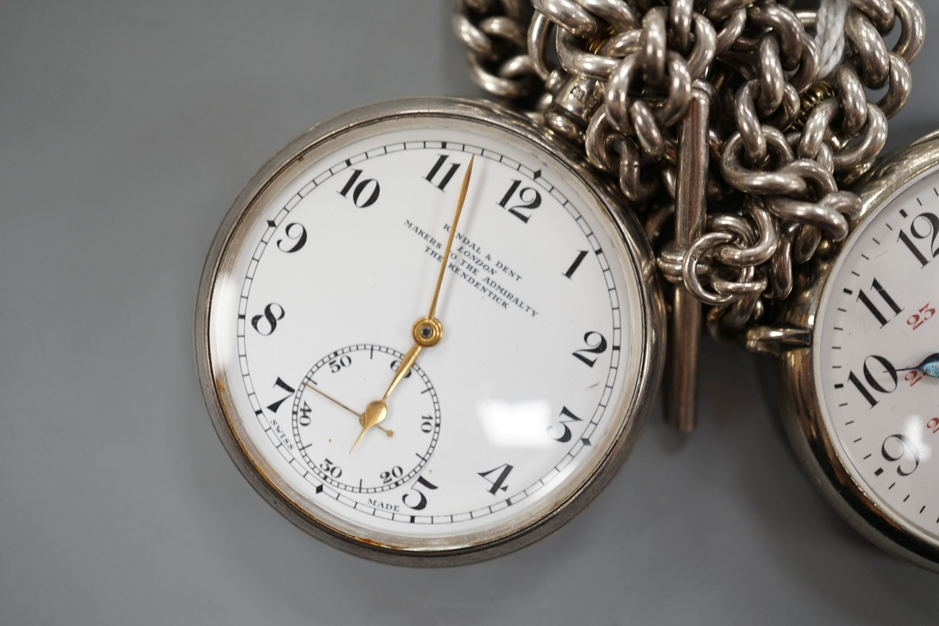 A 1930's silver open face pocket watch by Kendal & Dent and a chrome cased Longines pocket watch, both with alberts, one hallmarked silver.